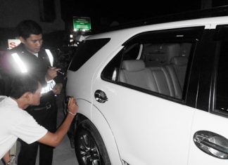 Police inspect and record the damage to Chukiet’s Toyota Fortuner.